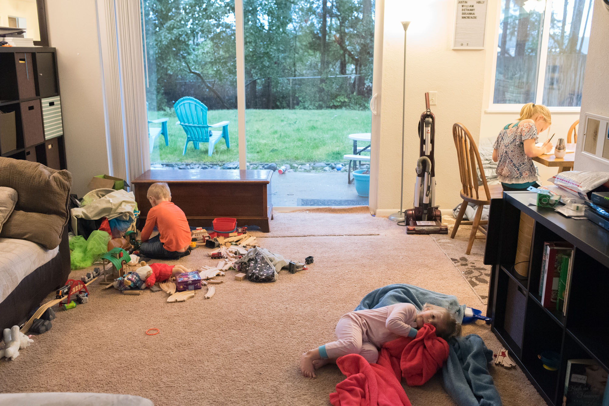 children have a brief quiet moment - documentary photography military families