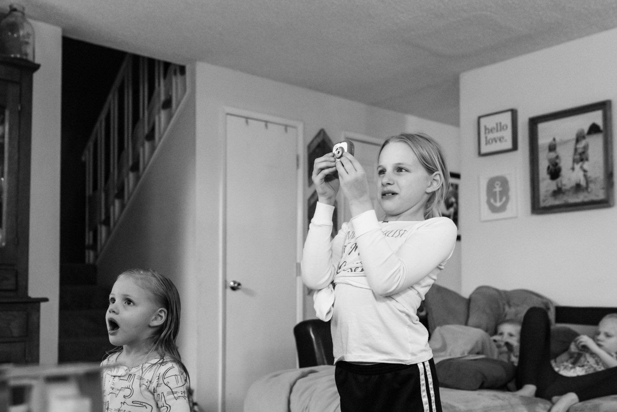 girls watching tv - documentary photography military families