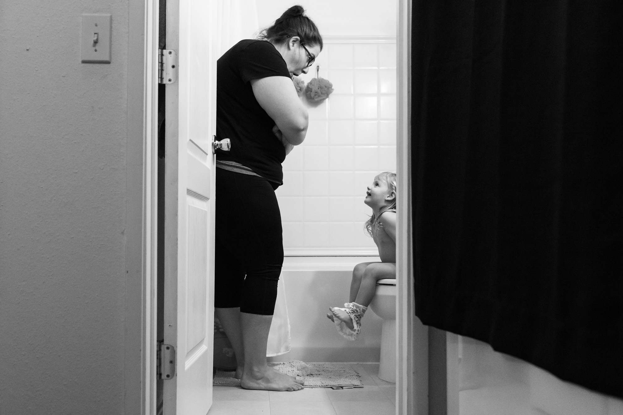 girl gets up to use bathroom - documentary photography military families