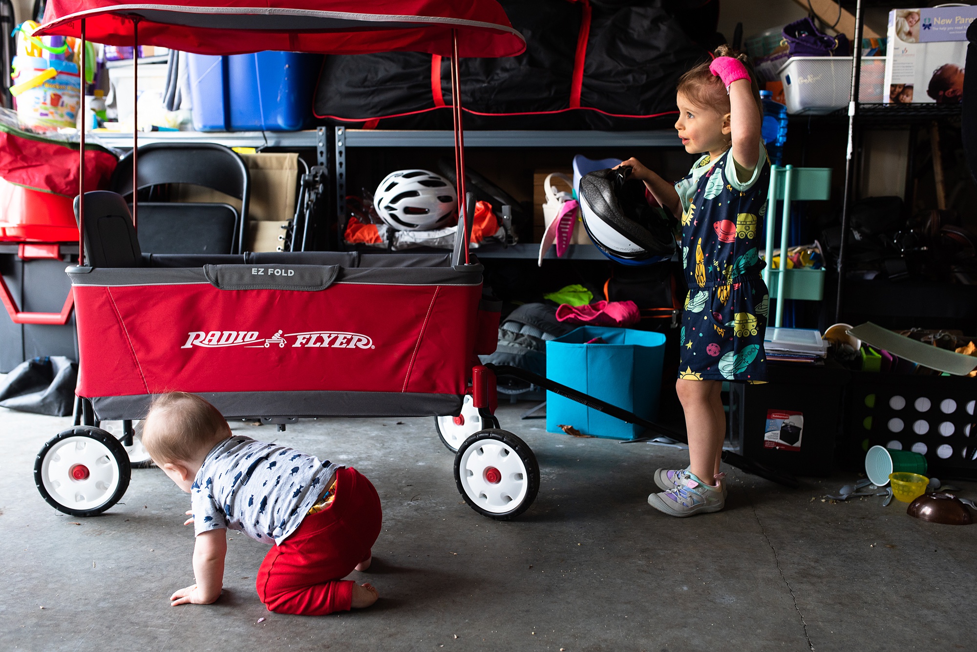 kids in garage with toys