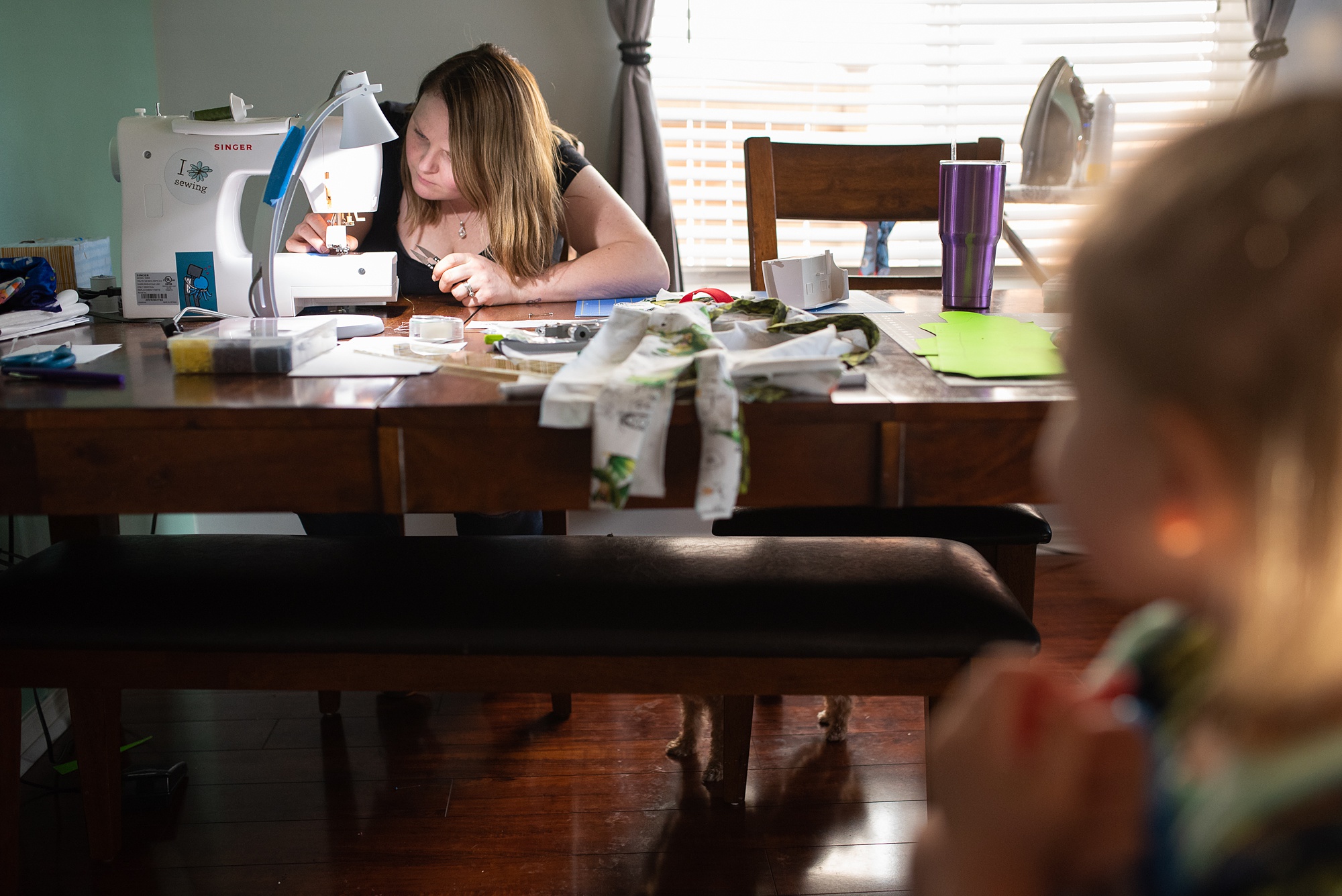mom sews after dinner