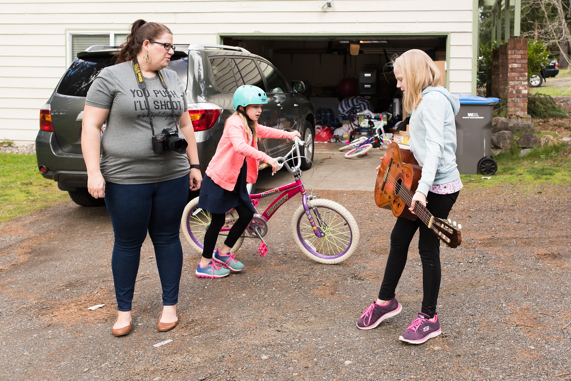 mom talks with daughters in driveway - military family photography