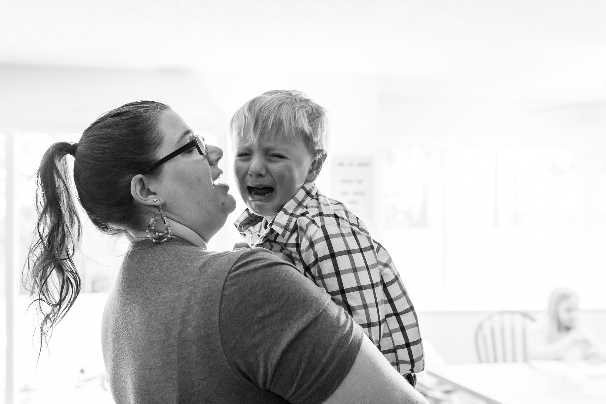 boy cries after fight with sister - military family photography