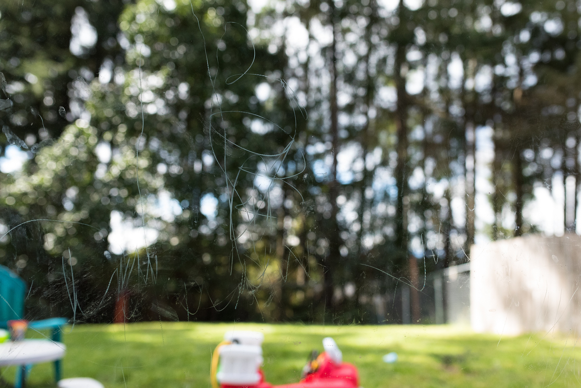 crayon on glass door - military family photography