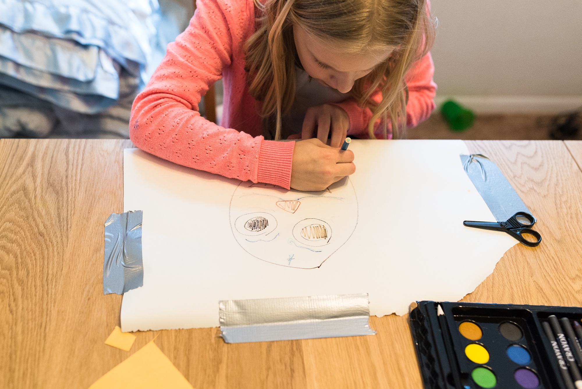 girl drawing at table - military family photography